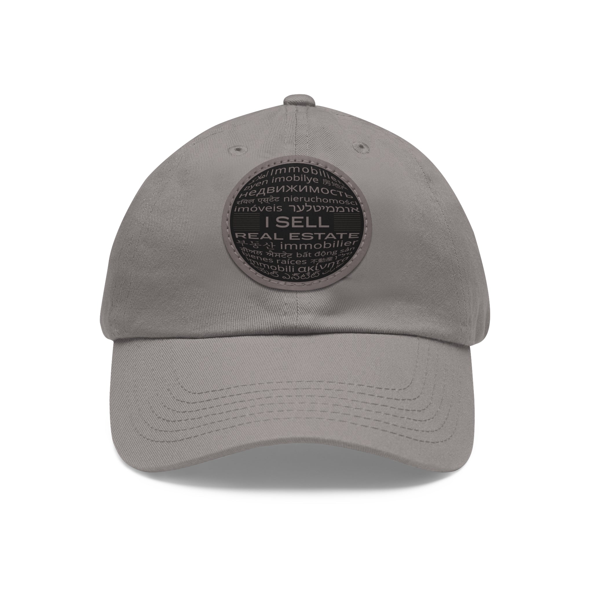 I Sell Real Estate Translated Dad Hat with Leather Patch (Round)