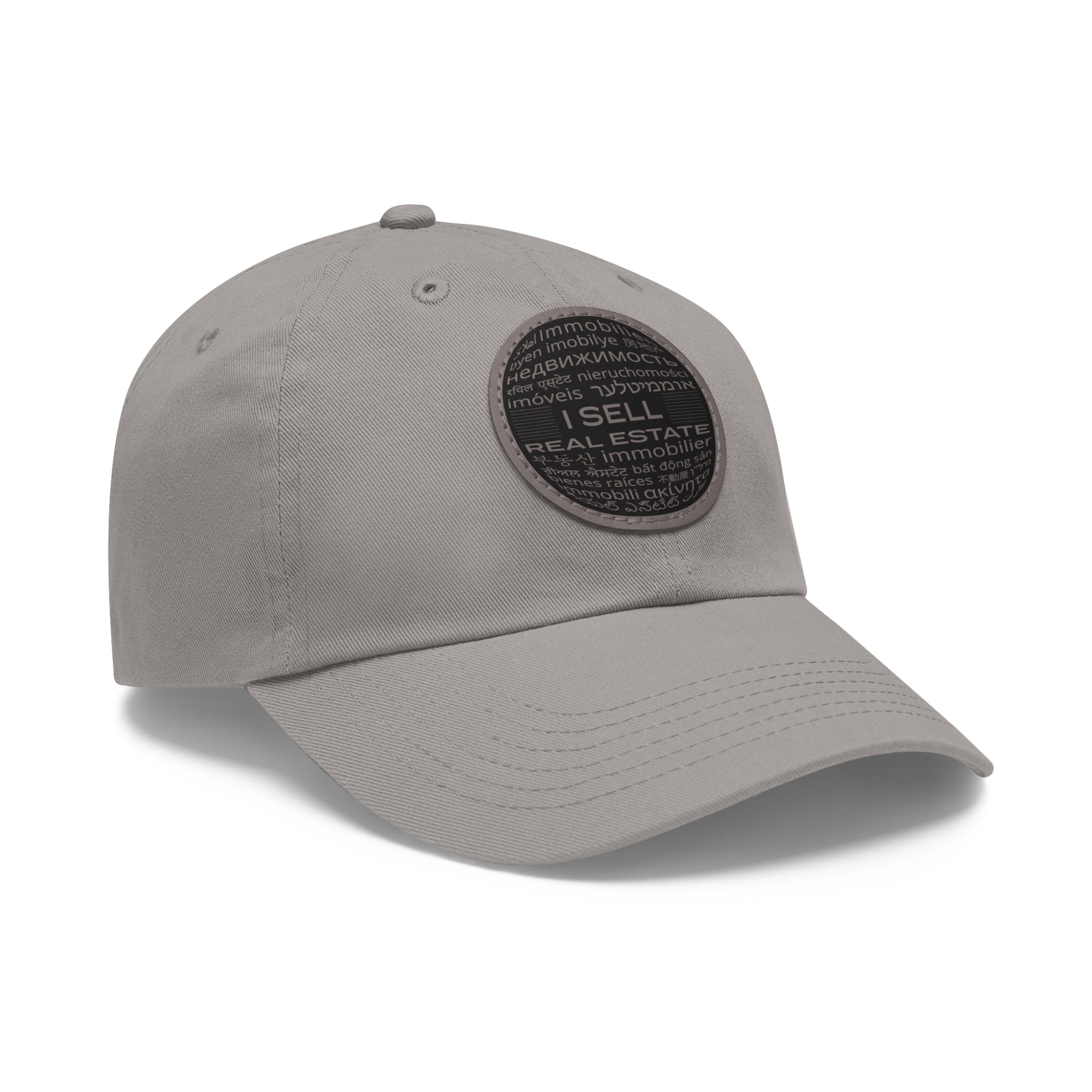 I Sell Real Estate Translated Dad Hat with Leather Patch (Round)