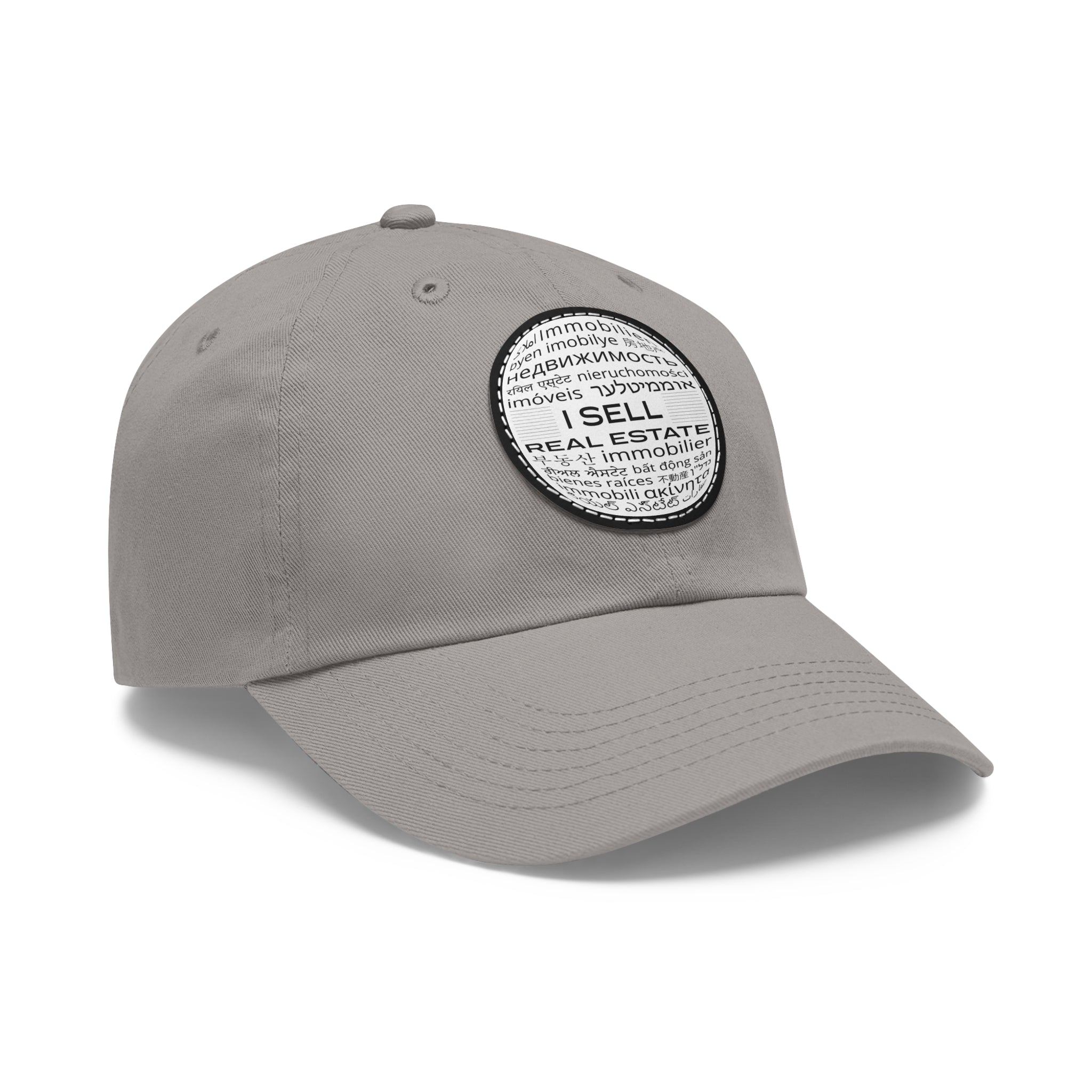 I Sell Real Estate Translated Dad Hat with Leather Patch (Round)